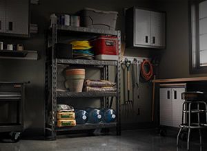 A garage workstation with various tools and equipment.